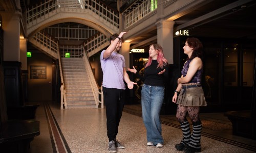 Prospective students walking around the University's Manchester Museum.